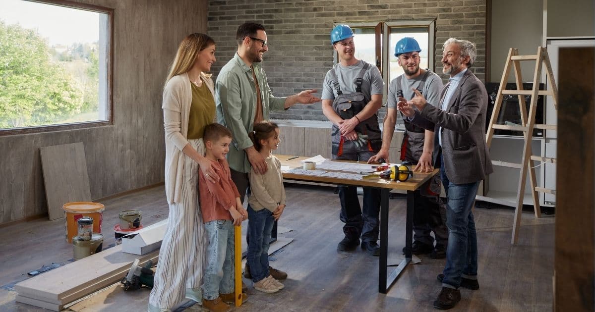 Realtor and contractor meeting with a homeowner family during a home service job